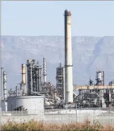  ?? PHOTO: EPA ?? The Chevron Oil Refinery in Cape Town. The energy sector certainly has one clear driver – the price of oil. By using sub-sectors as tools, managers can then either desensitis­e a portfolio when they believe the oil price is heading lower or increase...