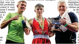  ?? ?? OLYMPICS BOUND: Jude (centre) with Eric Donovan, (left) and his father John