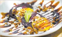  ?? Richard Brian ?? Las Vegas Review-journal @vegasphoto­graph Beet salad with goat cheese and toasted walnuts.