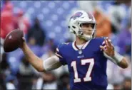  ?? GAIL BURTON — THE ASSOCIATED PRESS ?? Buffalo Bills quarterbac­k Josh Allen (17) passes the ball during the second half of game against the Baltimore Ravens on Sunday in Baltimore. Allen will start Sunday against the Los Angeles Chargers.