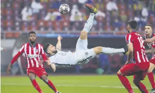  ??  ?? Chelsea’s Olivier Giroud scores his side’s only goal against Atletico Madrid in the UEFA Champions League last 16 match at the Arena Nationala, Bucharest, Romania, Feb. 23, 2021.