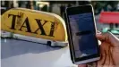  ??  ?? Digitale Dienstleis­tungen aller Art werden in Kenia seit Jahresanfa­ng besteuert - dazu gehört auch Fahrdienst­vermittler Uber
