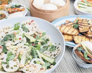  ?? KARON LIU PHOTOS/TORONTO STAR ?? Lotus rood salad and barbecue tofu bao. Tofu doesn’t get much love when it comes to grilling.