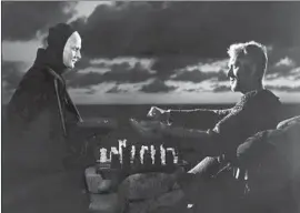  ?? Kobal Collection / Svensk Filmindust­ri ?? INGMAR BERGMAN’S “The Seventh Seal,” starring Bengt Ekerot as Death up against Max von Sydow’s knight, is one of the director’s indelible early classics.