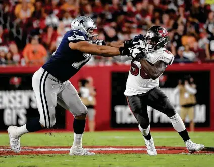  ?? Photos by Phelan M. Ebenhack / Associated Press ?? Cowboys right tackle La'el Collins, left, faced the Buccaneers in Week 1, but he now has been suspended five games for violating the league's substance abuse policy. Dallas also will be without backup tackle Ty Nsekhe (heat illness) on Sunday.