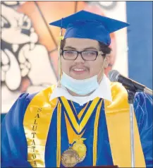  ??  ?? Francis Javier Perez opens the ceremony with his salutatori­an address to fellow classmates, family and friends.