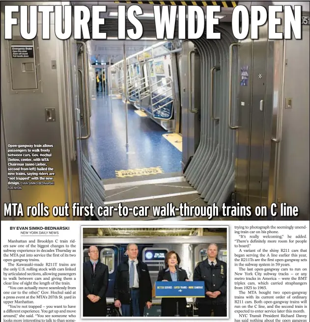  ?? EVAN SIMKO-BEDNARSKI FOR NYDN ?? Open-gangway train allows passengers to walk freely between cars. Gov. Hochul (below, center, with MTA Chairman Janno Lieber, second from left) hailed the new trains, saying riders are “not trapped” with the new design.