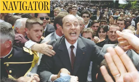  ?? PHILIPPE WOJAZER / REUTERS FILES ?? Then-French president Jacques Chirac greets members of the public invited to a garden party following a Bastille Day military parade at the Élysée Palace in Paris in July 1997. Chirac, who died Thursday, had a knack for connecting with voters, particular­ly in rural France.
