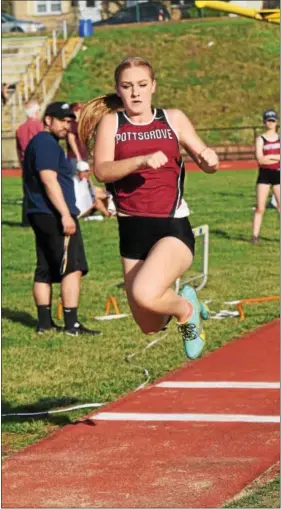  ?? AUSTIN HERTZOG — DIGITAL FIRST MEDIA ?? Pottsgrove’s Chloe Shivak competes in the triple jump during last week’s dual at Pottstown. Shivak placed second in the event with a 32-10.
