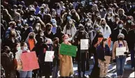  ?? Ned Gerard / Hearst Connecticu­t Media ?? Hundreds of students take part in a protest rally on the University of Connecticu­t campus in Storrs in February. The students gathered to express their frustratio­ns with the university’s handling of sexual assault cases.