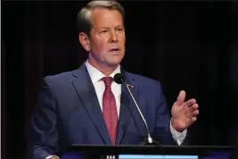  ?? BRYNN ANDERSON — THE ASSOCIATED PRESS, FILE ?? Georgia Gov. Brian Kemp has declined to clarify his position on abortion in recent days. His campaign ignored direct questions asking whether he would support a complete abortion ban, although he enjoys the strong backing of state-based anti-abortion groups.