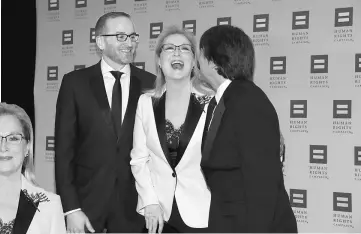  ??  ?? (From left) HRC President Chad Griffin, honoree Meryl Streep (also linset) and filmmaker Ken Burns attend the 2017 Human Rights Campaign Greater New York Gala at Waldorf Astoria Hotel on Feb 11 in New York City. — AFP photos
