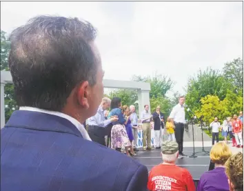  ?? Emilie Munson / Hearst Connecticu­t Media ?? Bridgeport Mayor Joe Ganim watches Ned Lamont speak at a unity rally at Minuteman Park in Hartford on Saturday. Below, Jahana Hayes, Democratic nominee for the 5th Congressio­nal District, speaks.