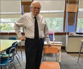  ?? COURTESY OF DAN GILL ?? Teacher Dan Gill at Glenfield Middle School in Montclair, N.J., keeps an empty chair in his classroom —a symbol of acceptance — after a racist incident from his childhood left an indelible memory. “We will always have room in the classroom for anyone,” he says.