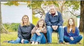  ?? (Courtesy Photo) ?? The Crawley family — Tim and Nikki Crawley and daughters Brittany and Jessica — have been named 2020 Members of Distinctio­n by Dairy Farmers of America. The Crawleys are owners of Crawley’s Valley View Farms in Gravette.