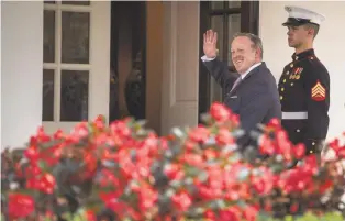  ??  ?? Former White House press secretary Sean Spicer walks into the West Wing on Friday after abruptly resigning his position at the White House.