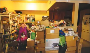  ?? Los Angeles Times/tns ?? Linda Adrain, 80, is surrounded by her belongings in her small 350 square foot apartment in Santa Rosa on Nov. 19.