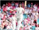  ?? Photo: AFP ?? Jonny Bairstow celebrates his first-innings century in Sydney.