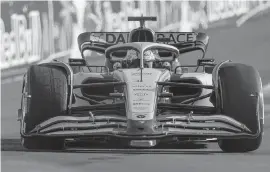  ?? MATIAS J. OCNER mocner@miamiheral­d.com ?? McLaren driver Daniel Ricciardo of Australia makes his way around the circuit during the second practice session of the Formula One Miami Grand Prix at the Miami Internatio­nal Autodrome in Miami Gardens on Friday.