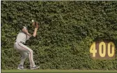  ?? MARK BLACK — THE ASSOCIATED PRESS ?? San Francisco Giants center fielder Austin Slater (13) drops a ball hit by the Chicago Cubs’ Rafael Ortega during the fourth inning Sunday in Chicago.