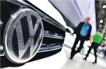  ?? JOHN MACDOUGALL/AFP/GETTY IMAGES ?? The EU Commission says it received informatio­n that BMW, Daimler, Volkswagen and VW units Audi and Porsche held talks to discuss clean technologi­es for limiting car emissions.