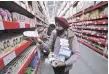  ?? — Reuters ?? A customer shops at a Walmart store in Zirakpur, Punjab.