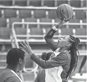  ??  ?? Memphis forward Ashia Jones warms up before the start of March 4’s game versus Temple. BRAD VEST/THE COMMERCIAL APPEAL