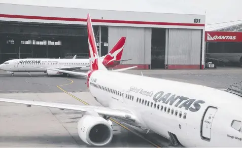  ??  ?? Qantas has grounded three Boeing 737s due to cracks found in wing structures.