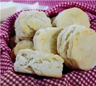  ?? Tribune News Service photos ?? ■ Homemade biscuits, above, and Peanut Soup, below, are culinary traditions in some parts of the South.