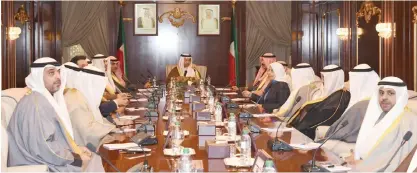  ?? — KUNA ?? KUWAIT: His Highness the Prime Minister Sheikh Jaber Al-Mubarak Al-Jaber Al-Sabah chairs the first meeting of the newly-formed cabinet yesterday.