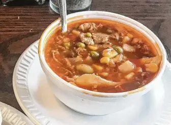  ?? J.C. Reid / Contributo­r ?? Brunswick stew is served at Stamey’s in Greensboro, N.C.