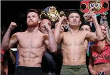  ??  ?? In this Sept. 15, 2017, file photo, Canelo Alvarez, (left) and Gennady Golovkin pose during a weigh-in in Las Vegas. Alvarez has withdrawn from his planned middleweig­ht title fight with Golovkin, the latest result from Alvarez testing for a banned...