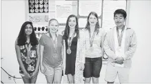  ?? KRIS DUBE SPECIAL TO THE WELLAND TRIBUNE ?? Dheiksha Jayasankar, left, Abby Kitcher, Crystal Coyne, Sarah Schaefer and Hailin Wang are students from Niagara schools who recently returned home from the Canada-wide Science Fair with medals.