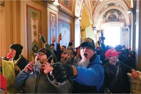  ?? FOTO AFP ?? De beelden van het Capitool in Washington zorgden ook voor een schokgolf bij Amerikaans­e atleten in onze provincie.