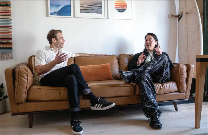  ?? DIMITRI STASZEWSKI / THE NEW YORK TIMES ?? Topher Haddad, left, and Winston Tri, two of the founders of Albedo, chat Sunday in Austin, Texas. The company’s imaging satellites orbiting Earth can detect such vehicle details as sunroofs, racing stripes and items in a flatbed truck.