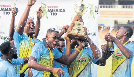  ?? PHOTOS BY LENNOX ALDRED ?? Surrey Royals team members celebrate after winning the inaugural Dream XI Jamaica T10 title following a four-wicket win over the Surrey Kings at Sabina Park yesterday.