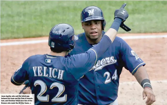  ?? AP ?? Jesus Aguilar, who said the talent gap between his team and the Cubs is nonexisten­t, and Christian Yelich were two of five Brewers who made the All-Star Game.