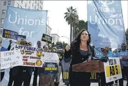  ?? Rich Pedroncell­i Associated Press ?? LORENA GONZALEZ, the new head of the California Labor Federation, is bringing the United Farm Workers back into the fold after 16 years.