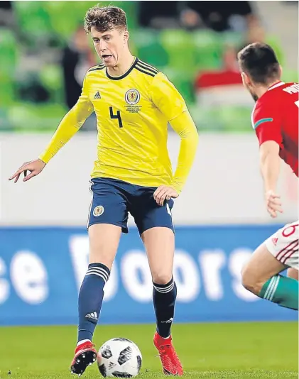  ?? Picture: Getty. ?? Jack Hendry made a composed and confident debut for Scotland in Budapest.