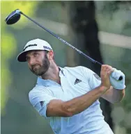  ?? SAM GREENWOOD/GETTY IMAGES ?? Dustin Johnson looks on during a practice round this week at East Lake Golf Club in Atlanta.