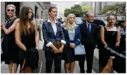  ?? EMILY MICHOT / MIAMI HERALD ?? Attorney David Boies with some of Jeffrey Epstein’s alleged sexual abuse victims, including Virginia Roberts Giuffre (left of Boies) as they enter the Thurgood Marshall U.S. Courthouse Aug. 27.