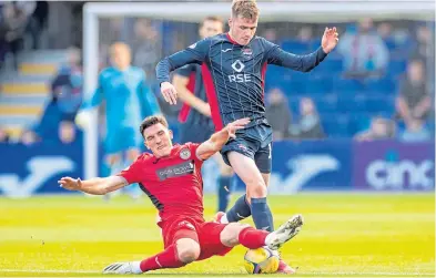  ?? ?? St Mirren’s Matt Millar tackles Jack Burroughs