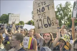  ?? Kent Nishimura Los Angeles Times ?? CROWDS of abortion rights supporters and opponents have descended on the Supreme Court since a leak indicated justices are ready to overturn Roe vs. Wade.