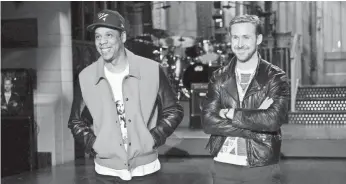  ?? ROSALIND O'CONNOR, NBC ?? Ryan Gosling, with musical guest Jay-Z, hosts the season premiere of Saturday Night Live.