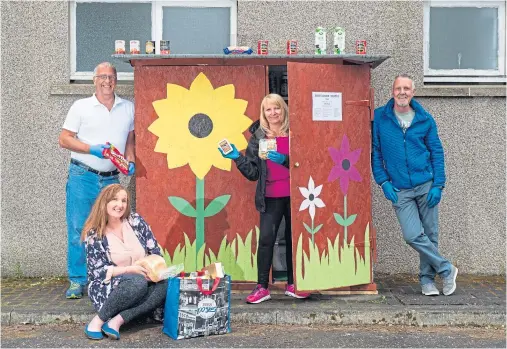  ?? Photograph by Jason Hedges ?? HELPERS: At the Portgordon Pantry are, from left, Paul McPherson, Lyndsay Mayo, Ruth Downie and Mick Grant.