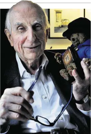  ??  ?? FROM DARKEST PERU: Michael Bond with his famous creation, Paddington Bear