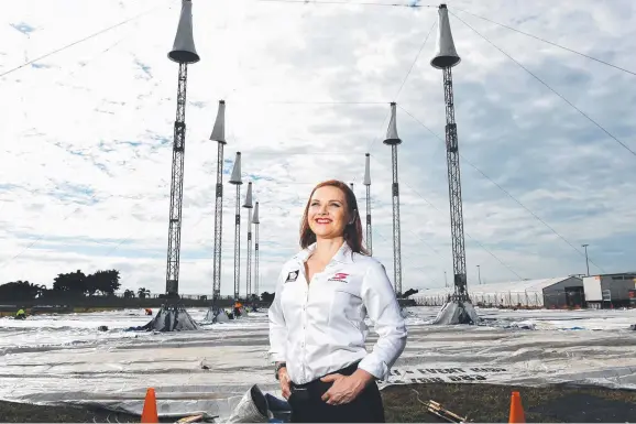  ?? EXCITING: Supercars events manager Rachael White in front of the big top that is being assembled at Reid Park. Picture: ZAK SIMMONDS ??