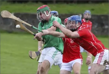  ??  ?? John Tubritt of Fethard in the thick of the action during Saturday’s final in New Ross.