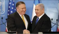  ?? AP PHOTO/MARK LENNIHAN ?? U.S. Secretary of State Mike Pompeo. left. is greeted by Israeli Prime Minister Benjamin Netanyahu ahead of a press conference at the Ministry of Defense in Tel Aviv, Sunday, April 29, 2018. (Thomas Coex, AFP via AP).