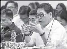  ?? GEREMY PINTOLO ?? Labor Secretary Silvestre Bello III stresses a point during a Senate committee hearing on human resources developmen­t and overseas employment yesterday.